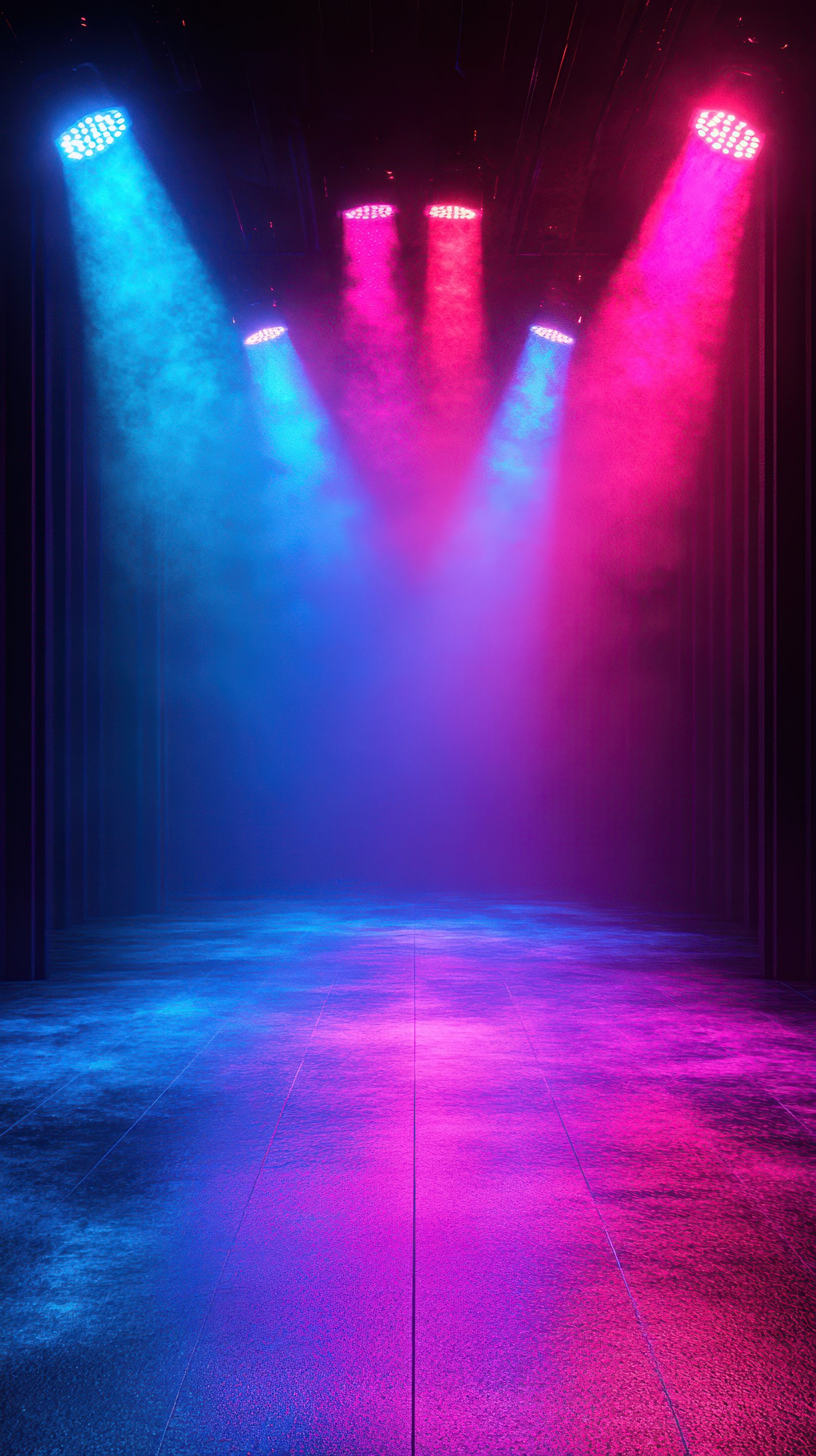 Dramatic lighting setup for a live performance stage with colorful fog effects in an indoor venue